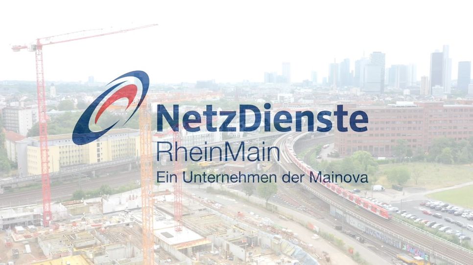© Screenshot aus dem Image-Film der NRM. Das Bild zeigt das Unternehmenslogo der NRM überblendet mit einem Blick auf Frankfurts Skyline